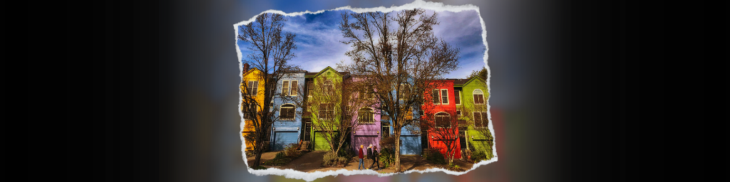 above the fold banner, black background, vibrant, colorful townhomes, bare trees, and 3 people walking 